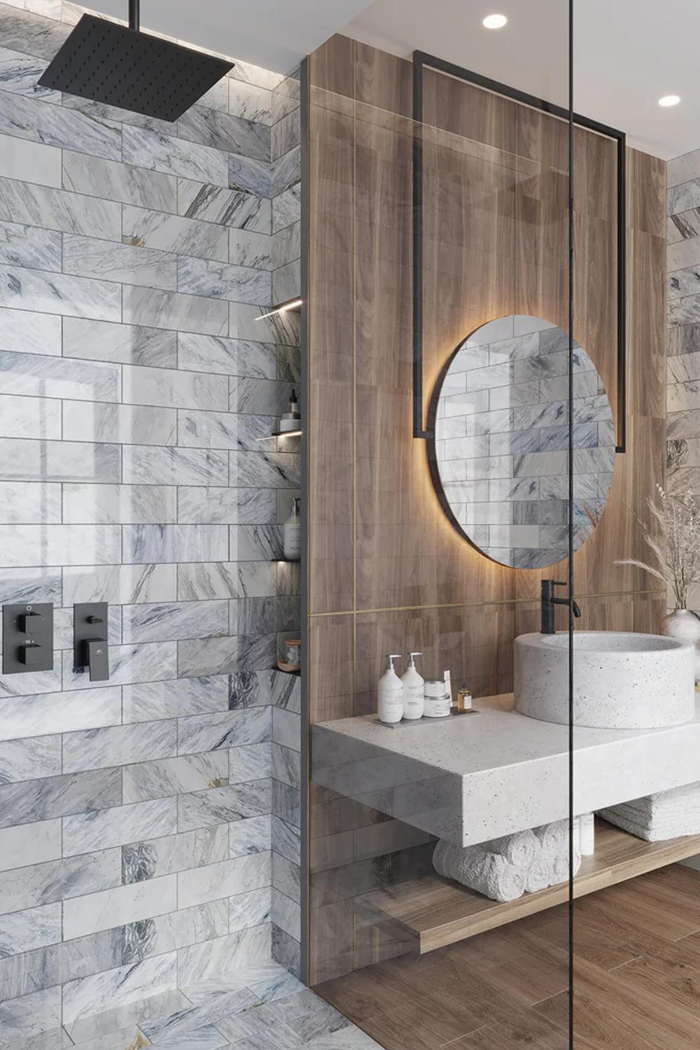 Charming marble tiles paired with warm wooden paneling in a modern bathroom.