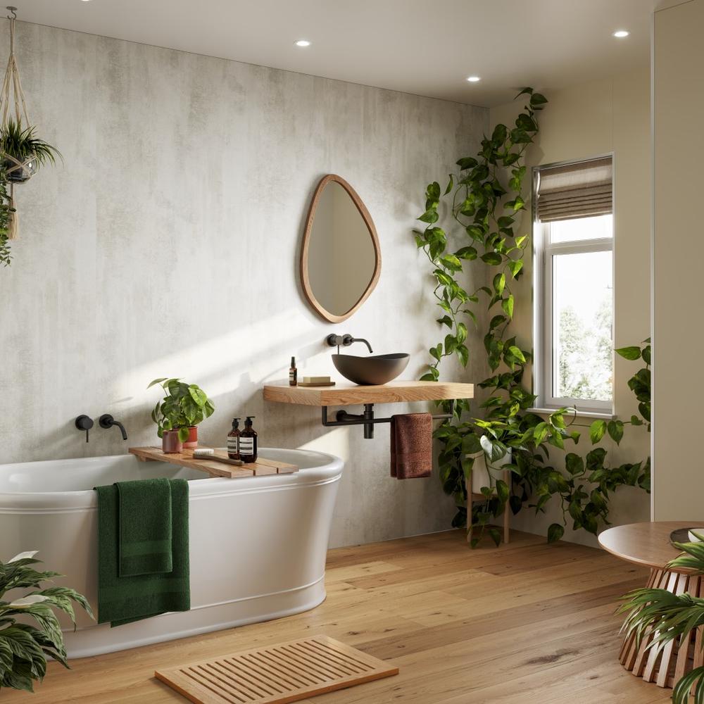 Baño moderno con acento en concreto y elementos naturales.