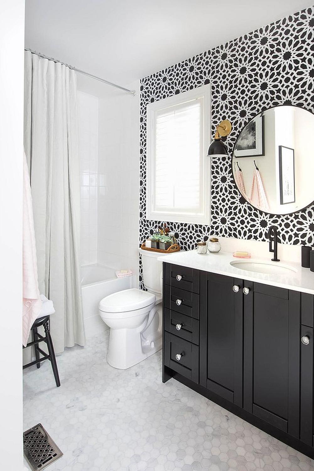 Elegant American farmhouse bathroom featuring black cabinetry with a classic design.
