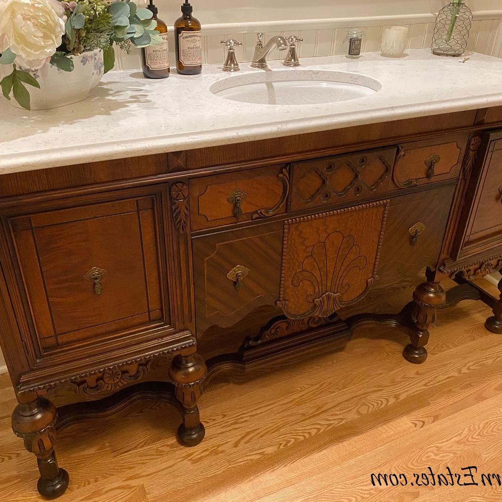 Antique bathroom vanity 879 en madera de caoba con detalles tallados