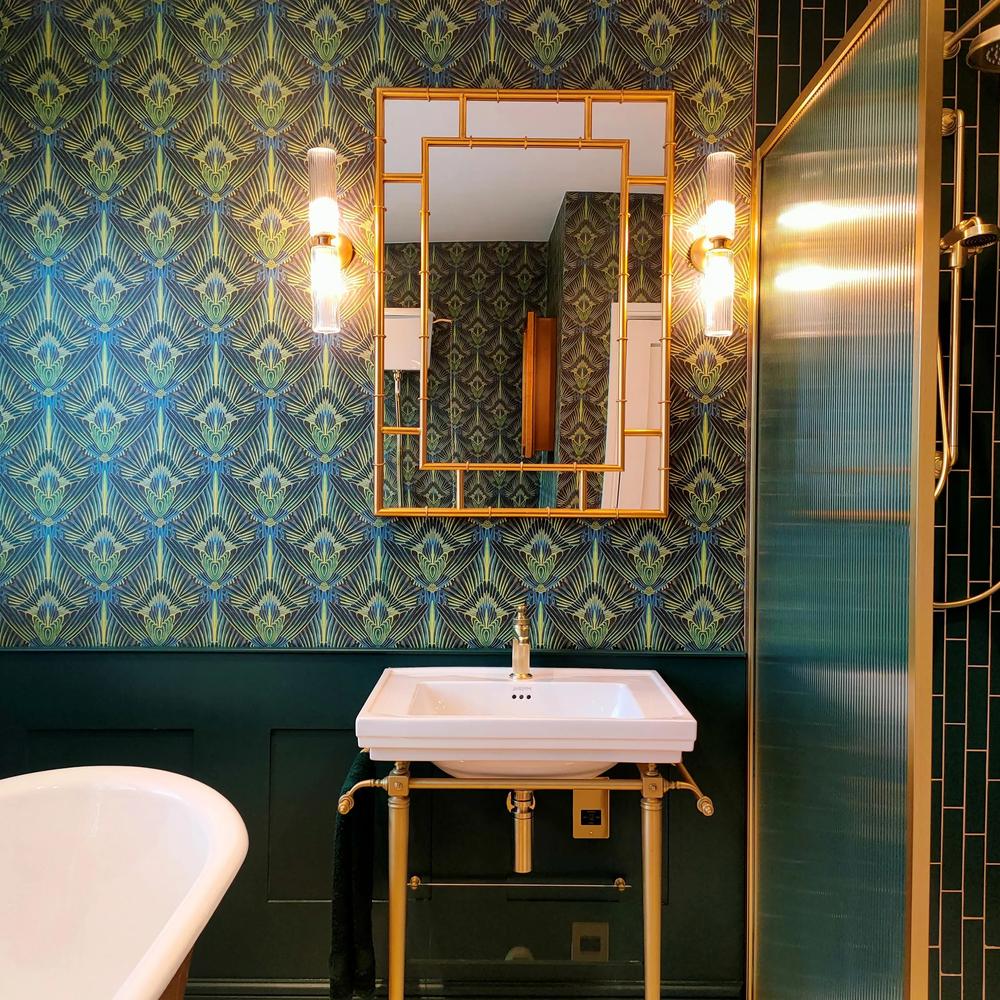 Art Deco bathroom with vibrant wallpaper and tropical themes
