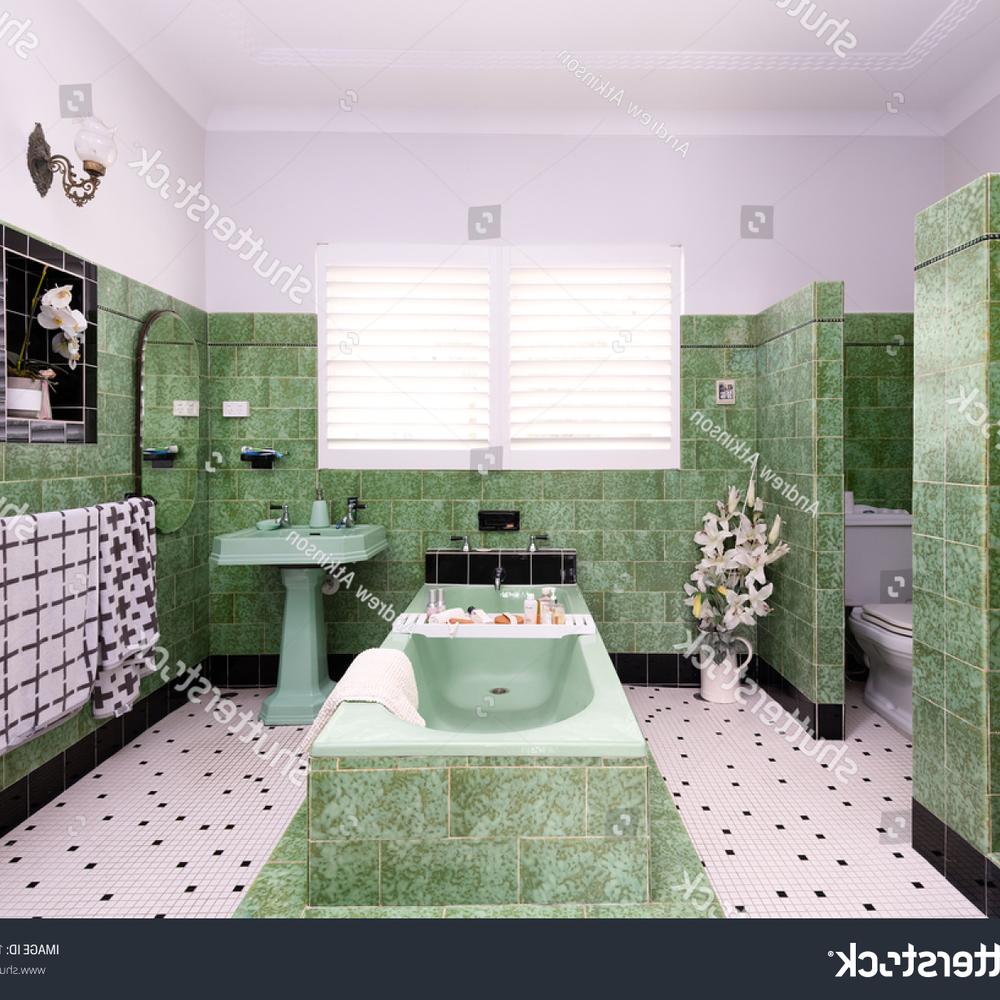 Art Deco bathroom uniting bold greenery with chic design elements