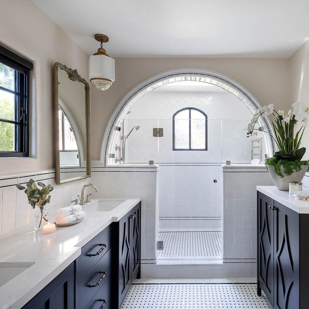 Soft white and beige Art Deco bathroom with elegant fixtures.
