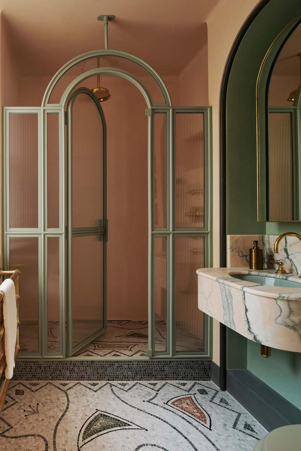 Art Deco bathroom in pastel shades featuring textured tiles.