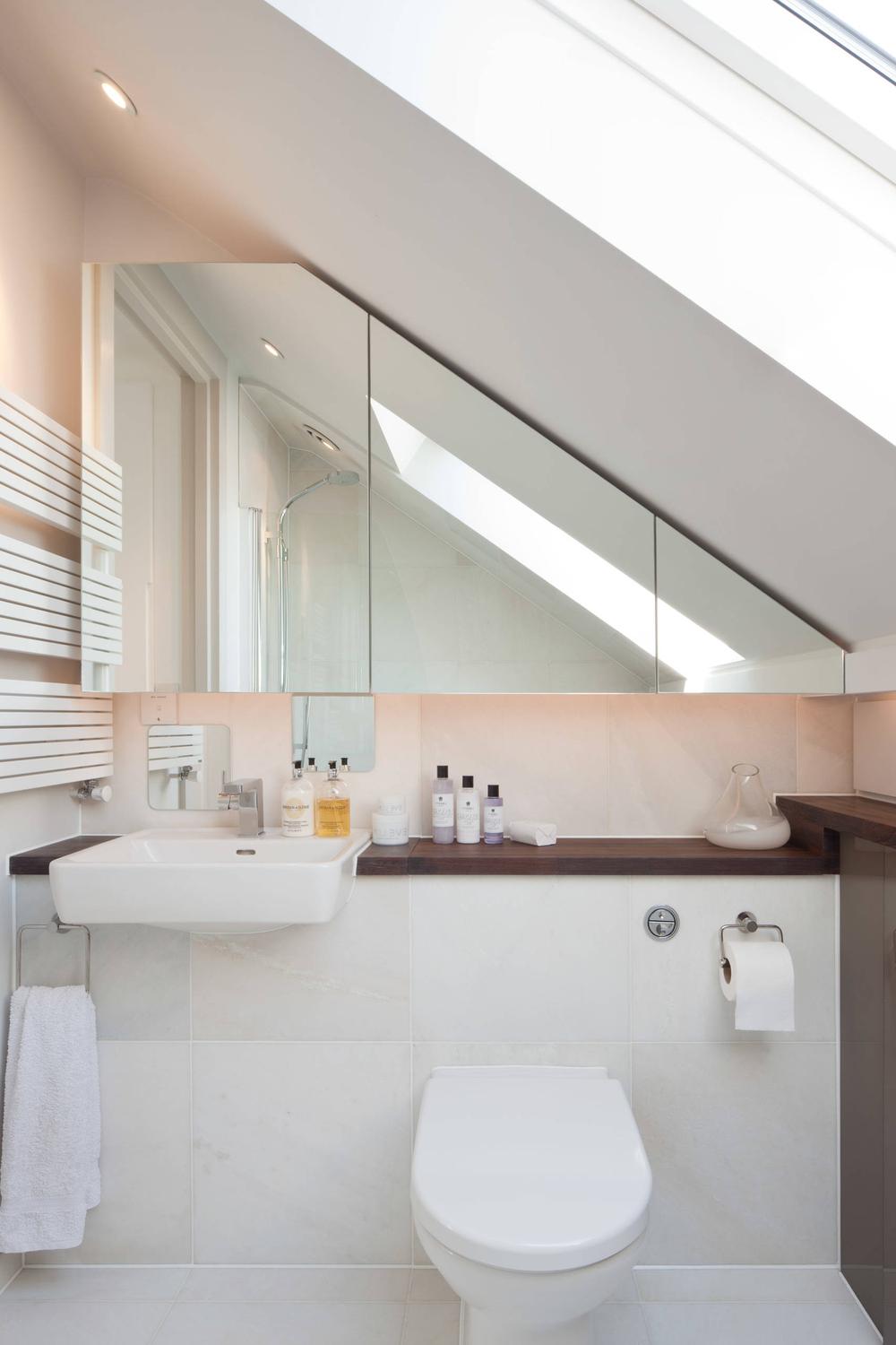 Attic bathroom featuring subtle textures for visual interest
