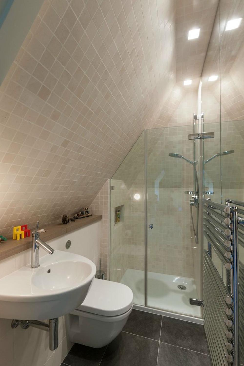 Operational elegance in a compact attic bathroom