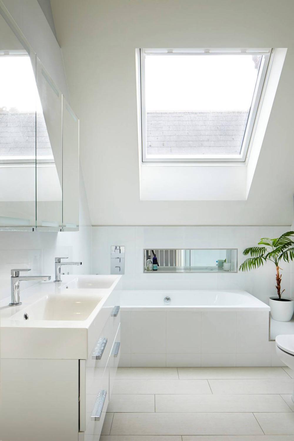 Architectural charm in a relaxed attic bathroom