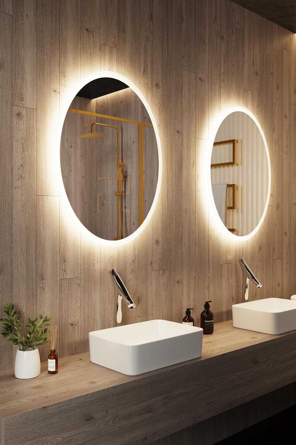 Two round backlit mirrors above a rustic wooden vanity in a modern bathroom