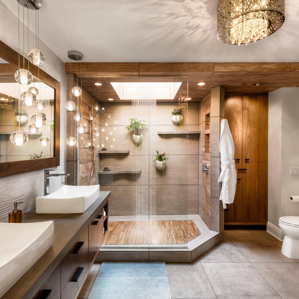 Baño moderno con ducha tipo spa y plantas decorativas