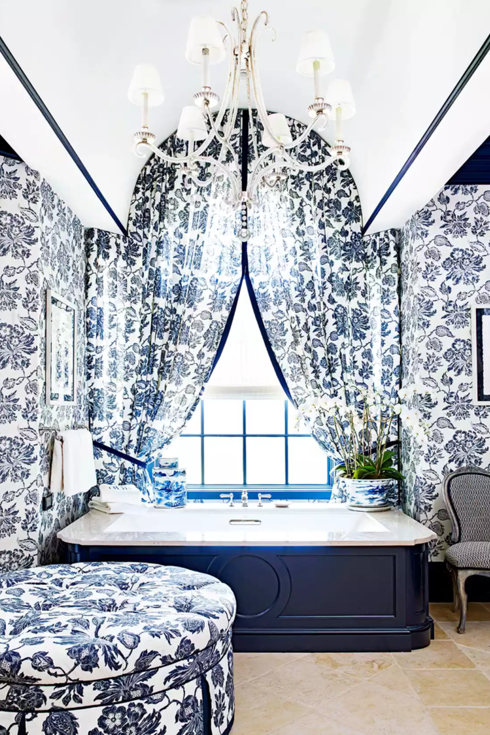 Sophisticated bathroom with floral patterned curtains