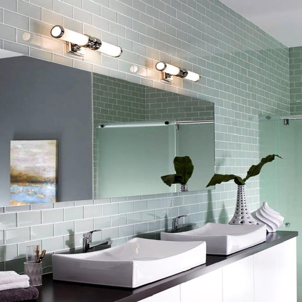 Acento moderno con iluminación en un entorno tranquilo del baño