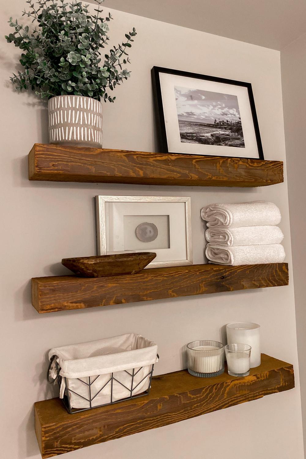 Bathroom shelves with plants and decorative items