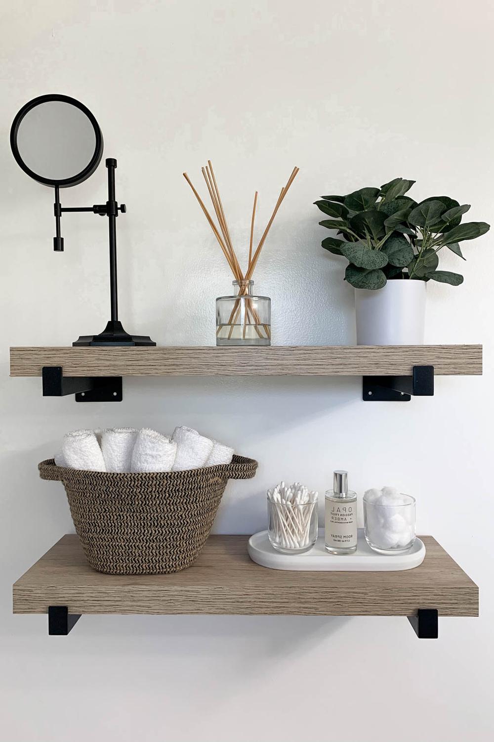Stylish bathroom shelves featuring natural decor and organization