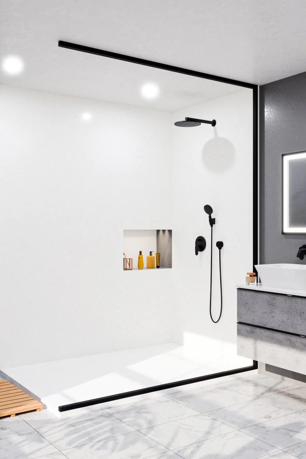 Sleek shower enclosed with glass and featuring a modern overhead rain shower head with wall niche