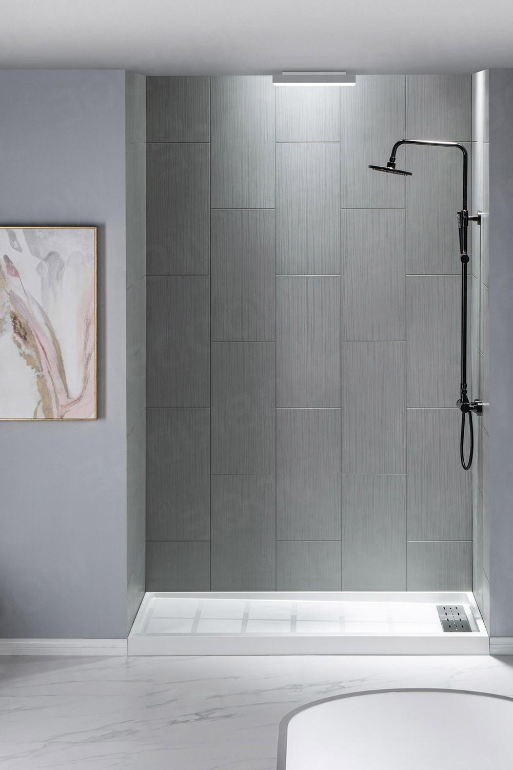 Elegant shower featuring textured tiles enhancing stylish modernity