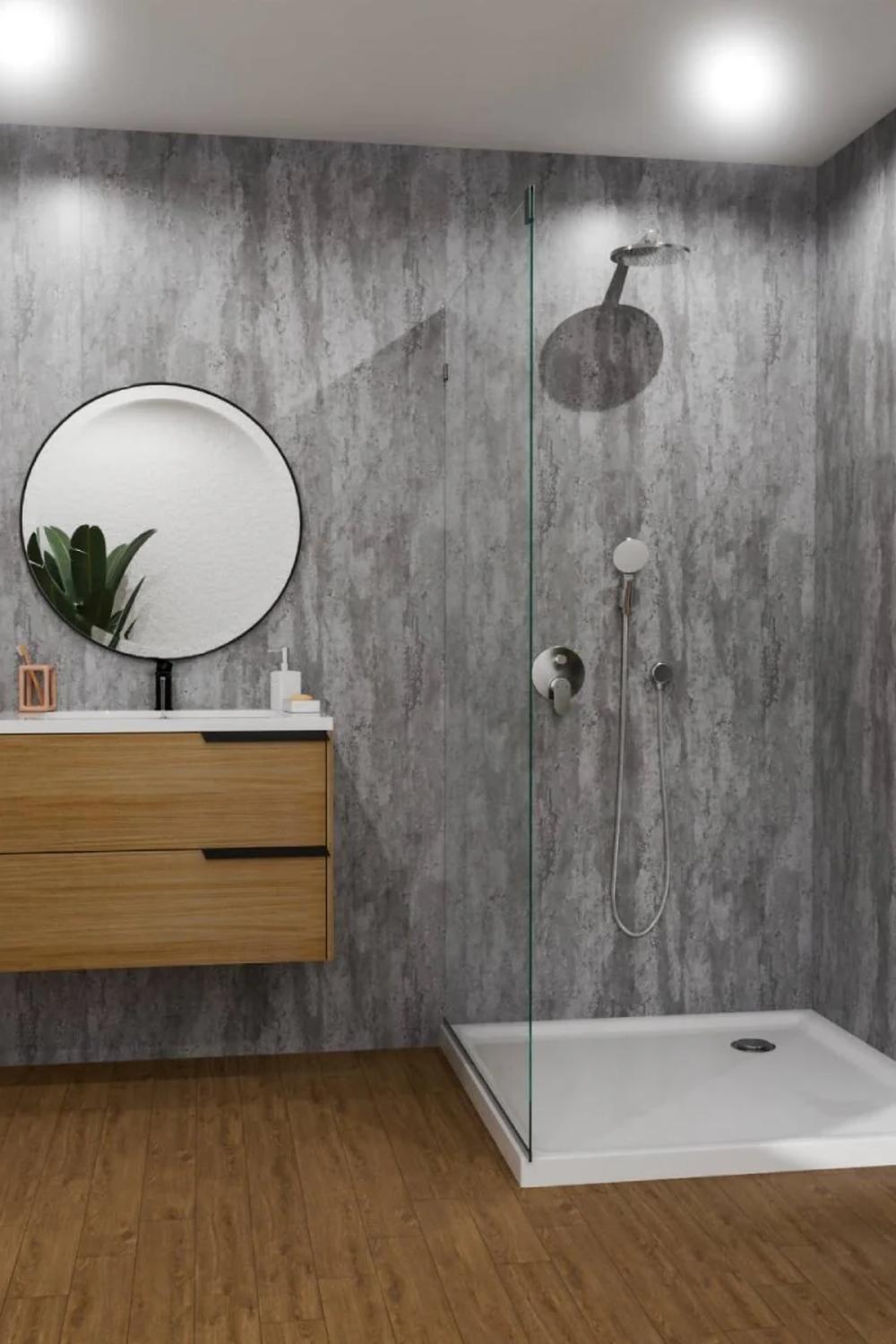 Sleek modern shower with gray textured walls and glass enclosure
