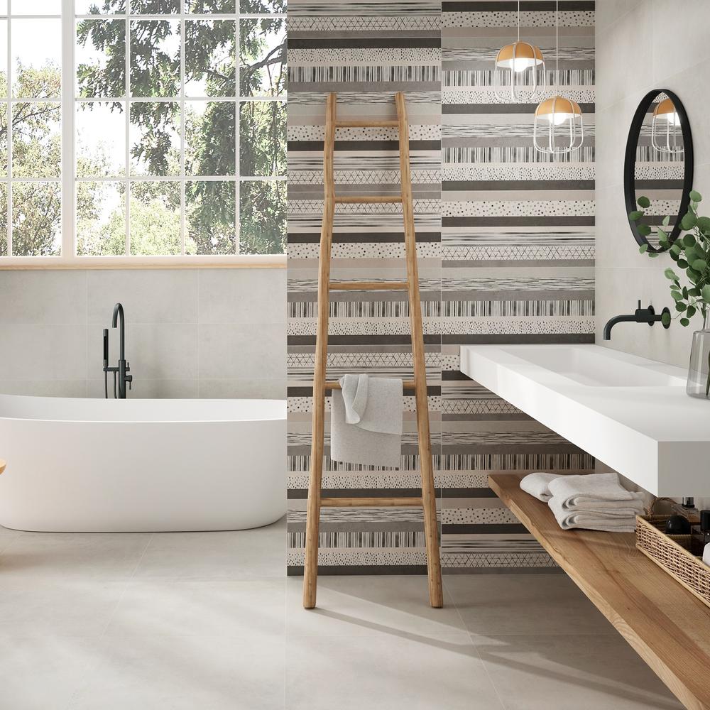 A modern bathroom design with patterned tiles and clean lines