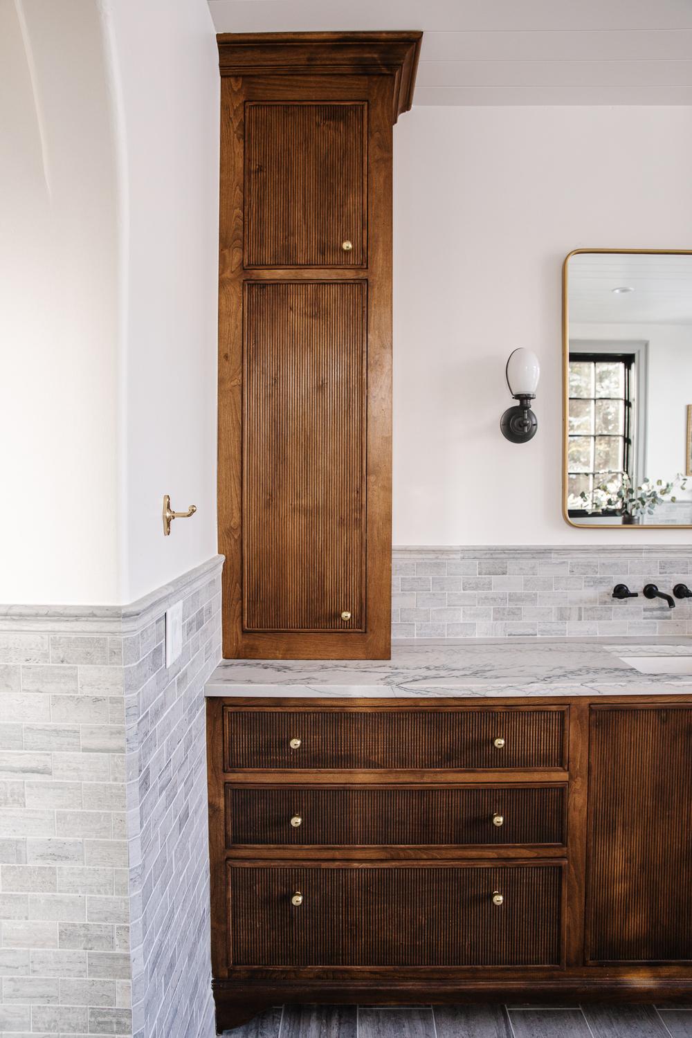 Striking Black and White Bathroom Vanity with Tall Side Cabinet