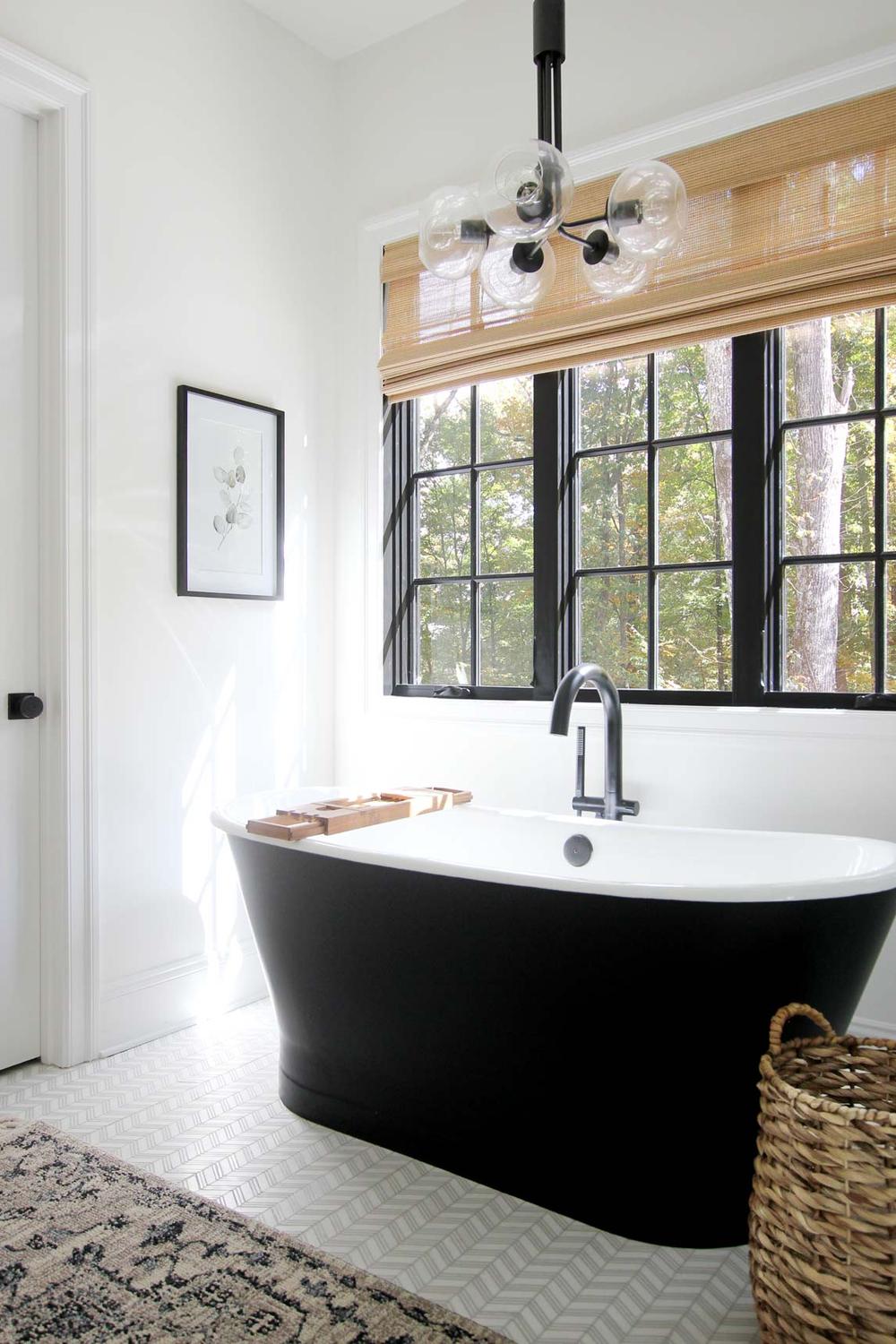 Modern Roller Shades for Effortless Style - a bathroom featuring minimalist design and wooden roller shades.