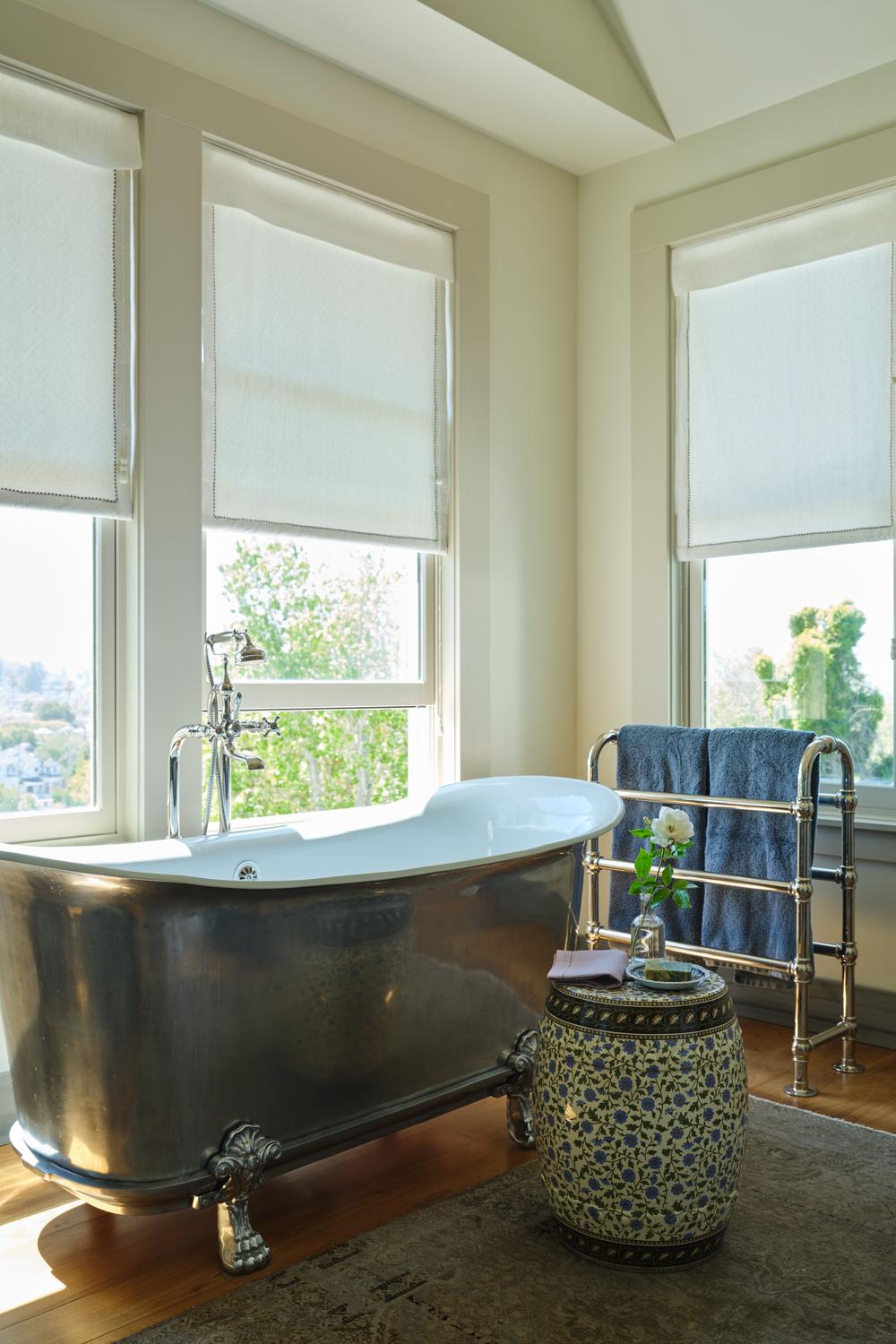 Vintage Charm with Clawfoot Design Accents - a beautifully designed bathroom with vintage bathtub.