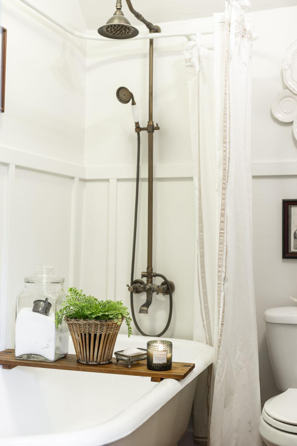 Inviting bathroom design featuring vintage charm blended with modern elements.