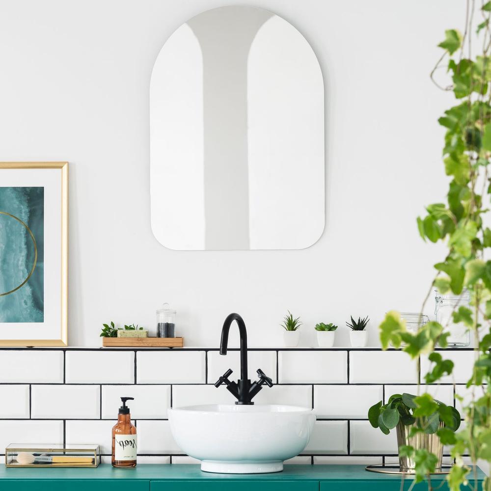 Minimalist sink area with potted plants