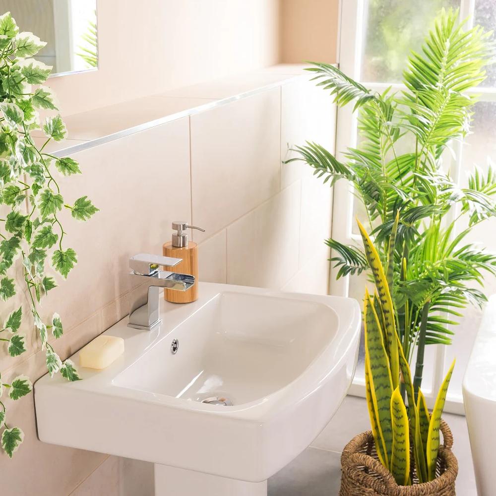 Modern bathroom featuring vibrant green vines