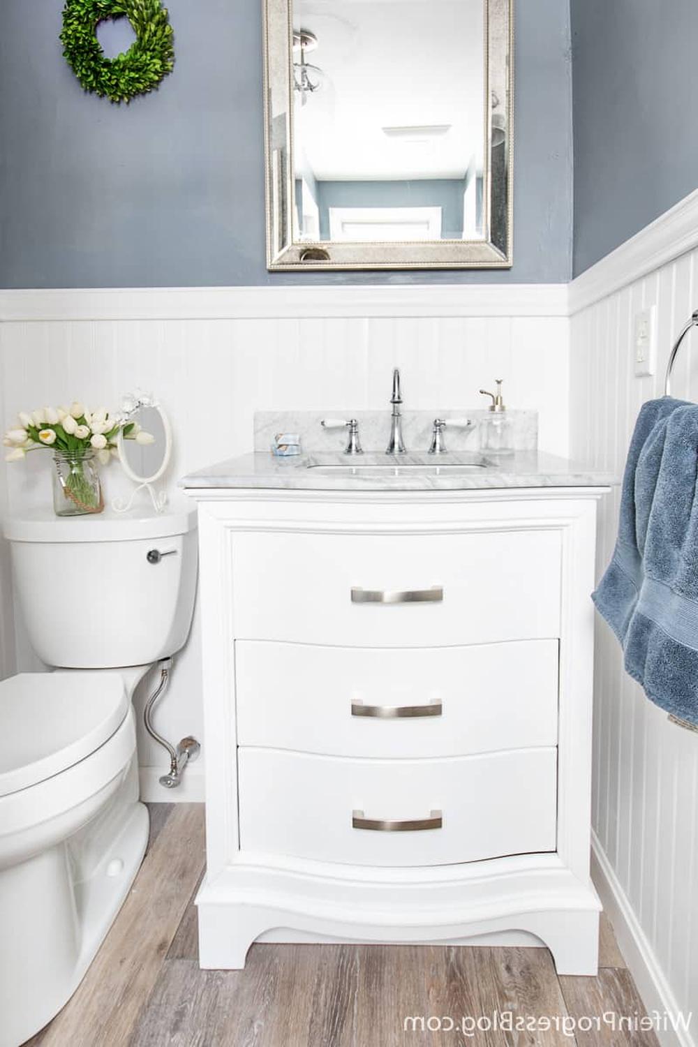 Stylish bathroom with sleek white vanity and beadboard accents