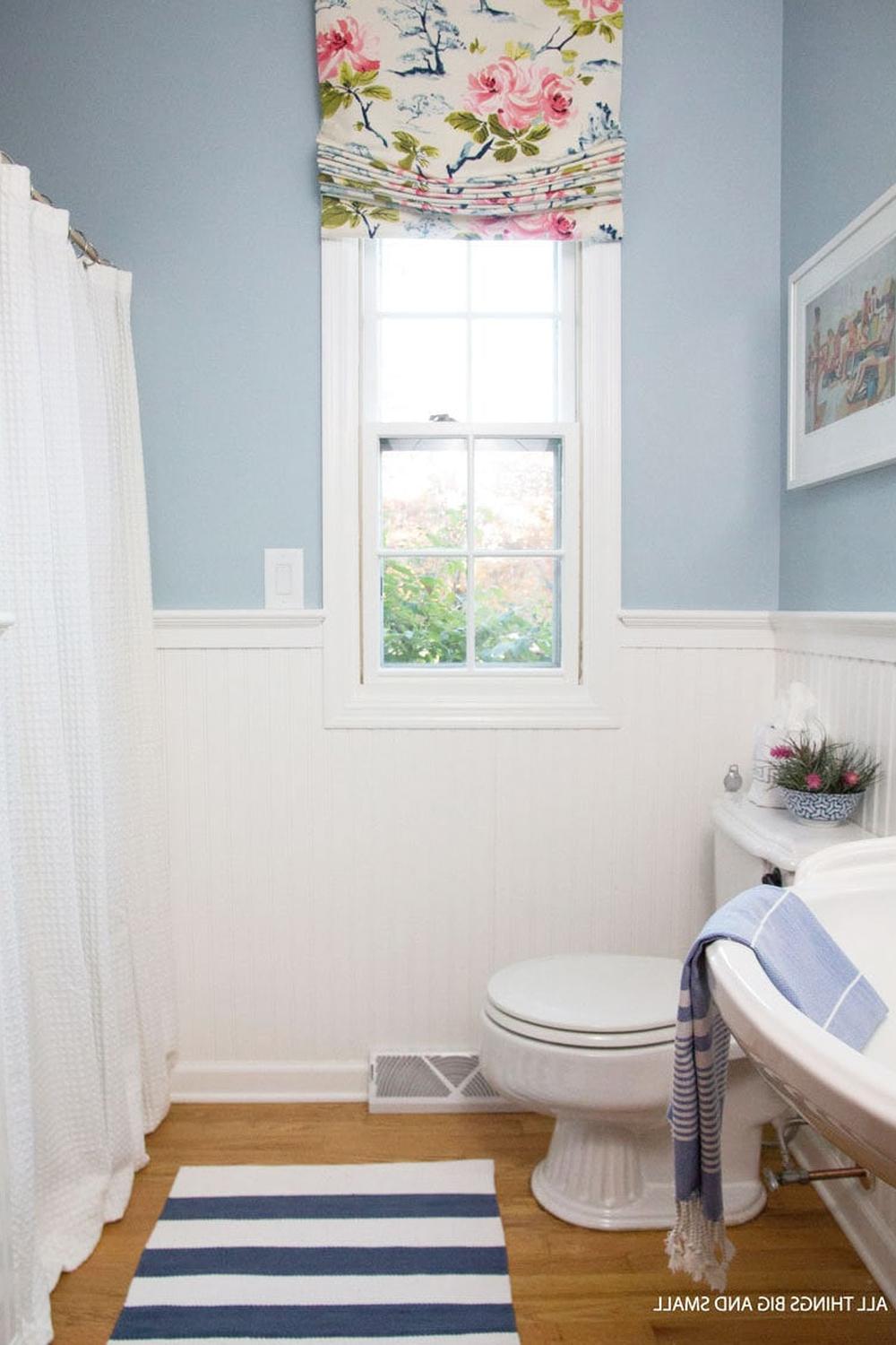 Charming bathroom showcasing vibrant beadboard and cheerful decor