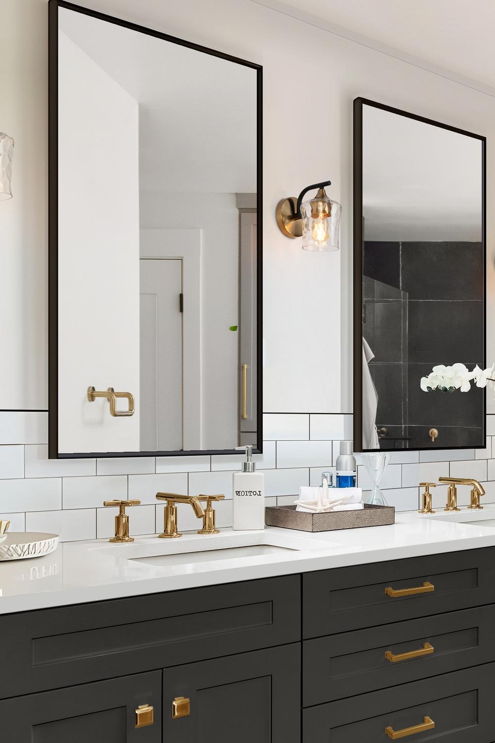 Baño cálido y acogedor en negro y oro