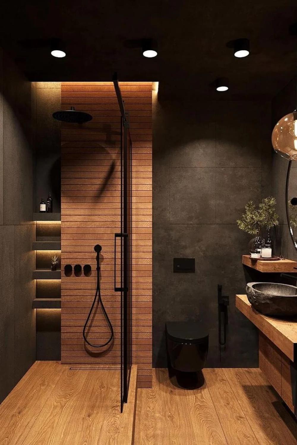 Cozy and stylish bathroom featuring a wooden slatted wall and black shower enclosure.