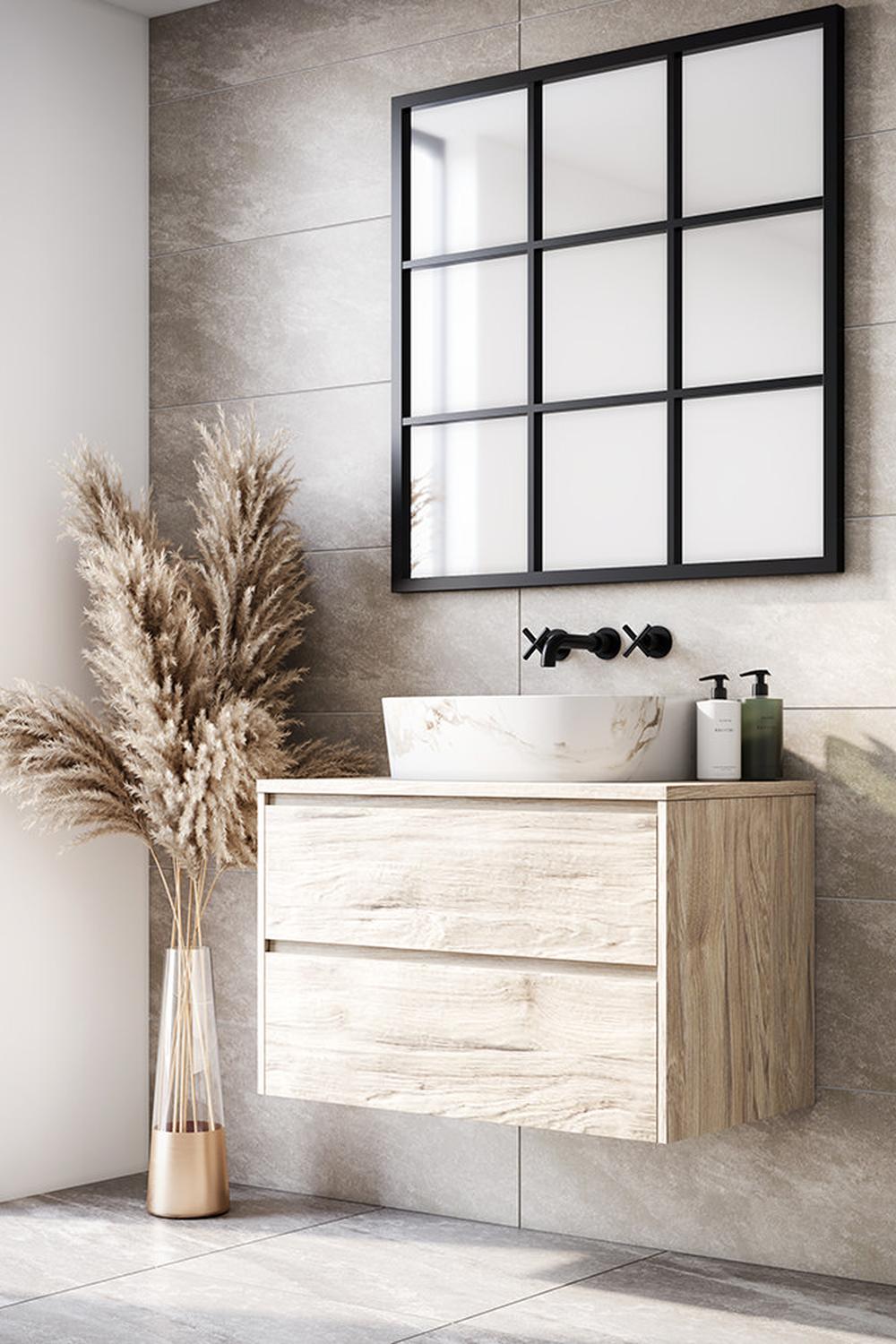 Grid-style black bathroom mirror serving as a unique focal point.