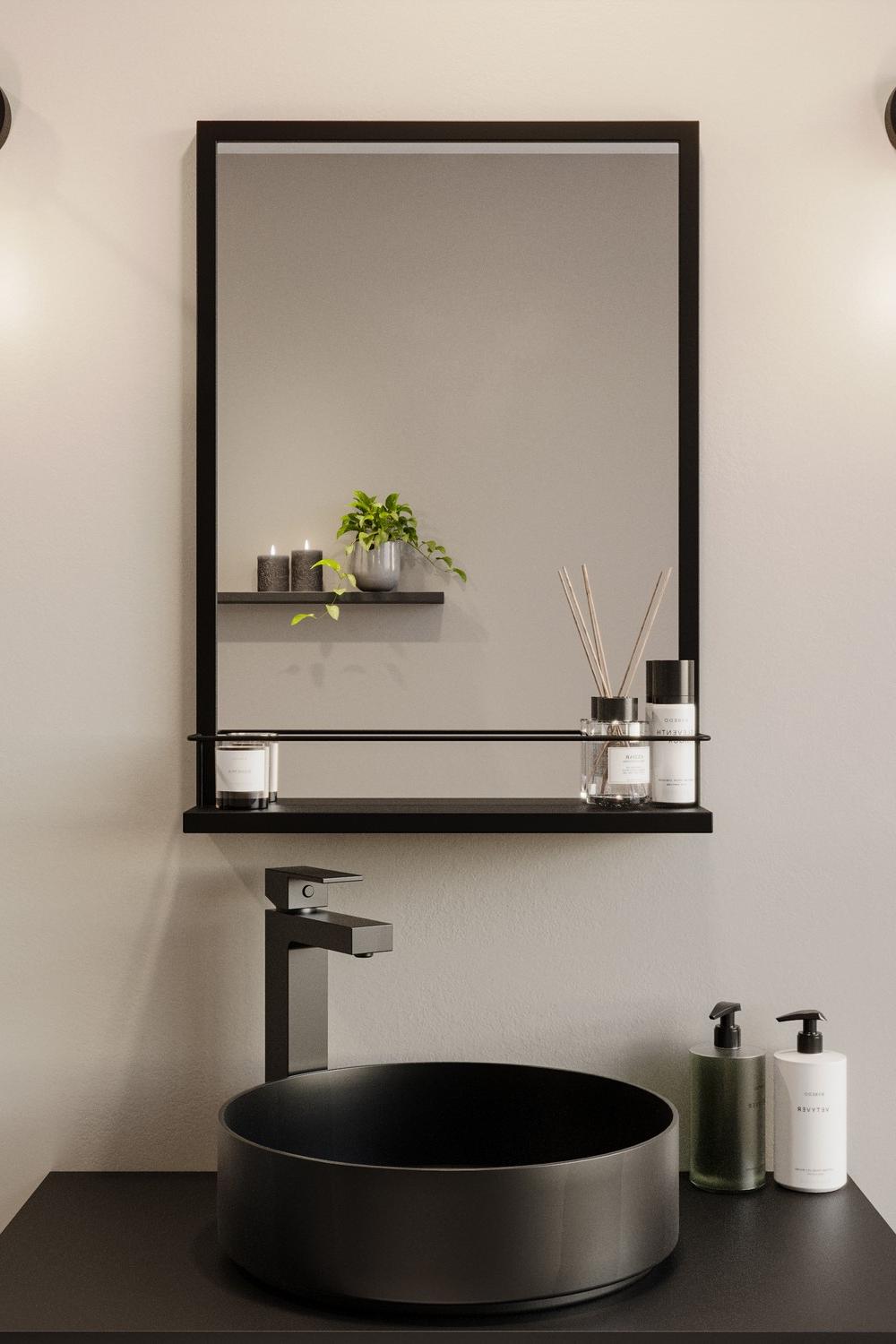 Striking black bathroom mirror showcasing modern elegance.