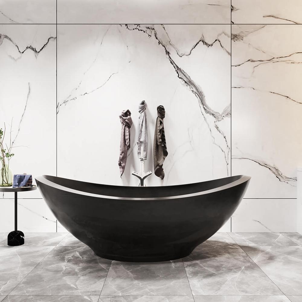 Stylish bathroom featuring a deep black bathtub and luxurious marble walls.
