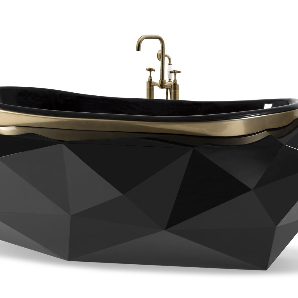 Stylish bathroom featuring a faceted black bathtub as an artistic statement.