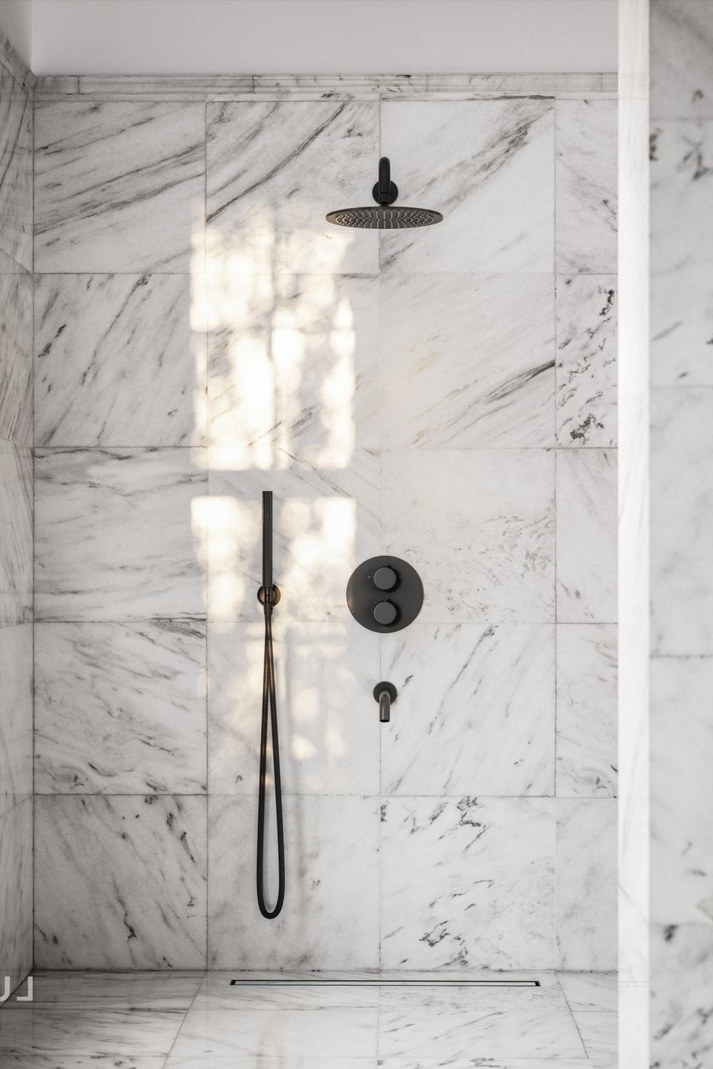 Baño minimalista con mármol y negro