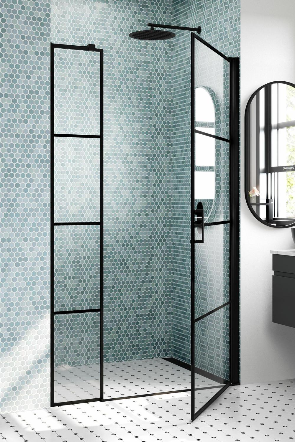 Diseño de ducha negra con azulejos hexagonales