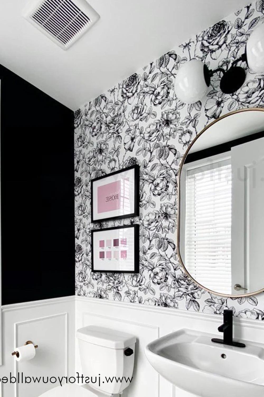 Stylish bathroom featuring a striking contrast of black and white.