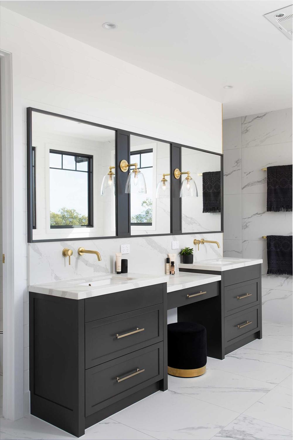 An elegant bathroom featuring impressive fixtures and modern design elements.
