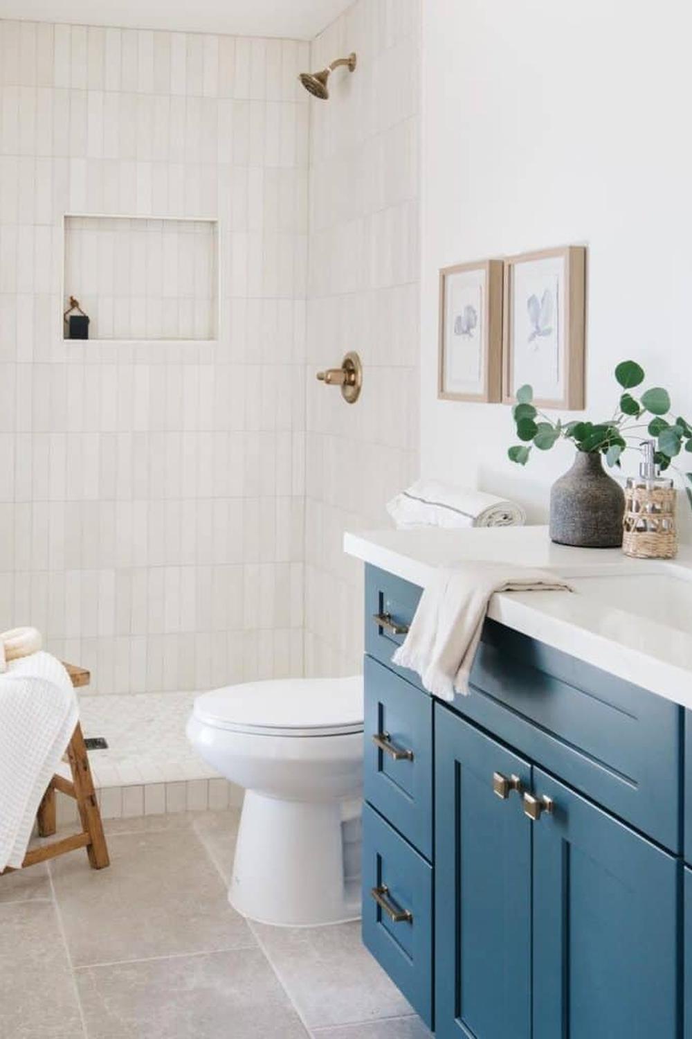 Clean lines and brass accents in modern bathroom