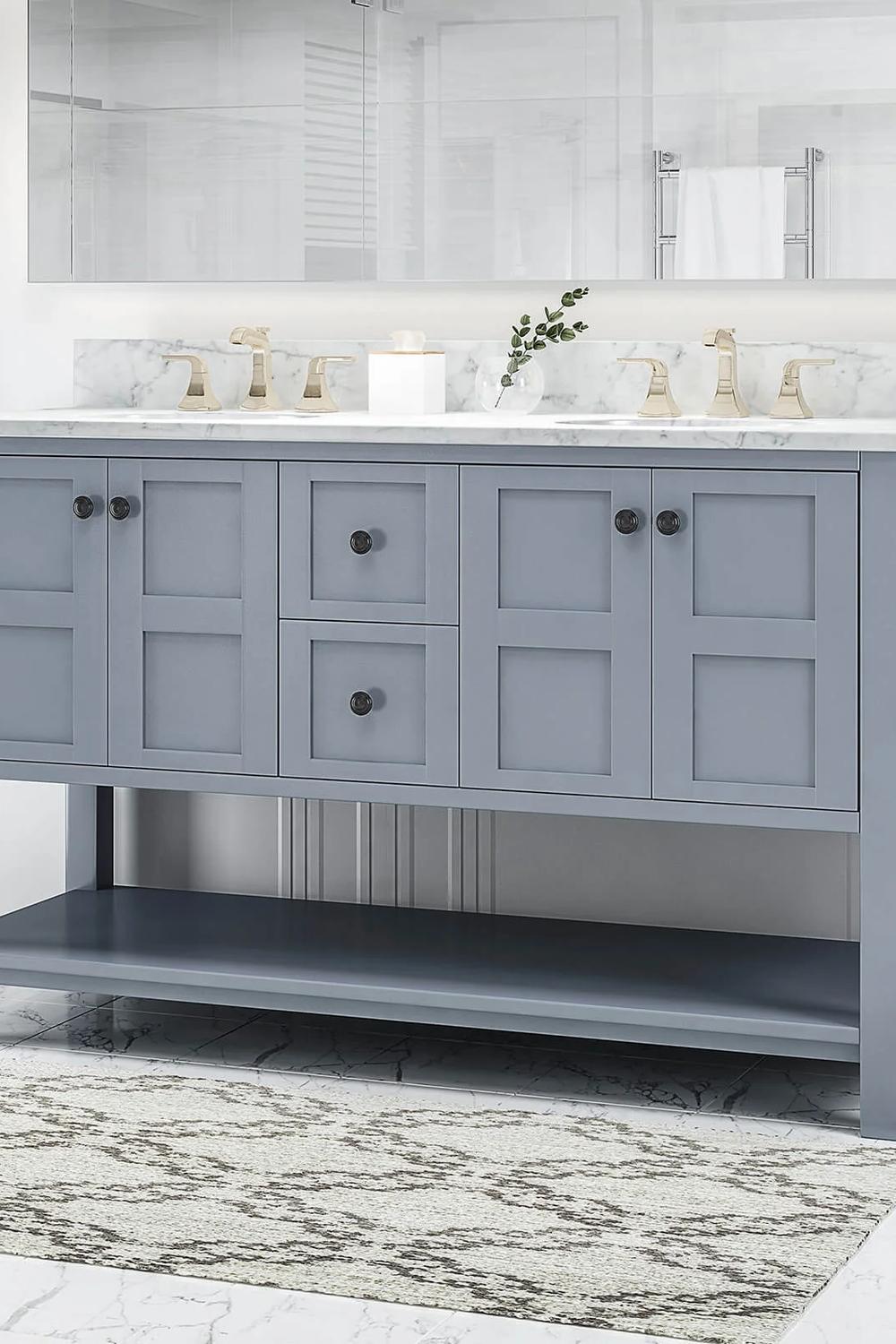 Lavabo elegante en azul y gris equilibrado