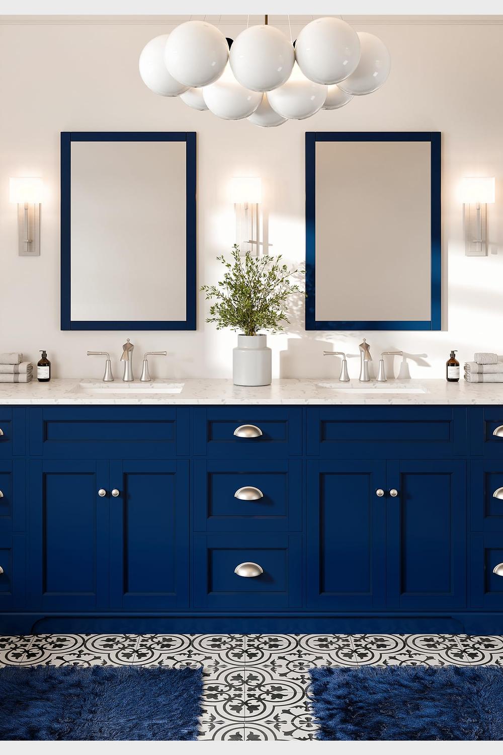 Stylish deep navy bathroom vanity with patterned tile flooring.