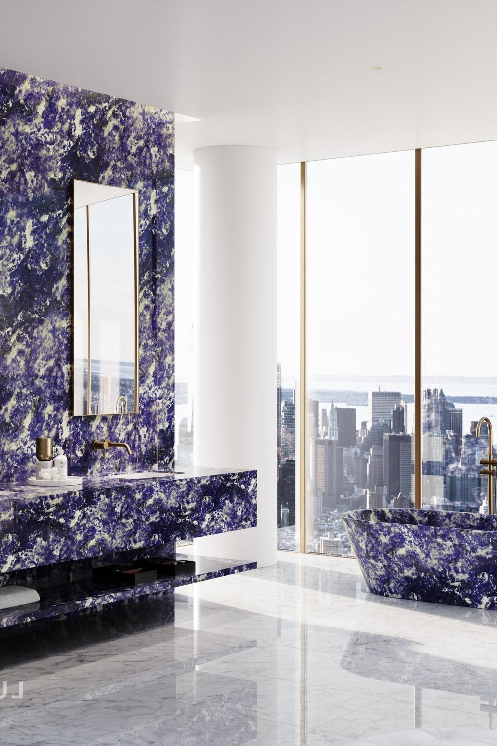 Baño curvilíneo con mármol azul