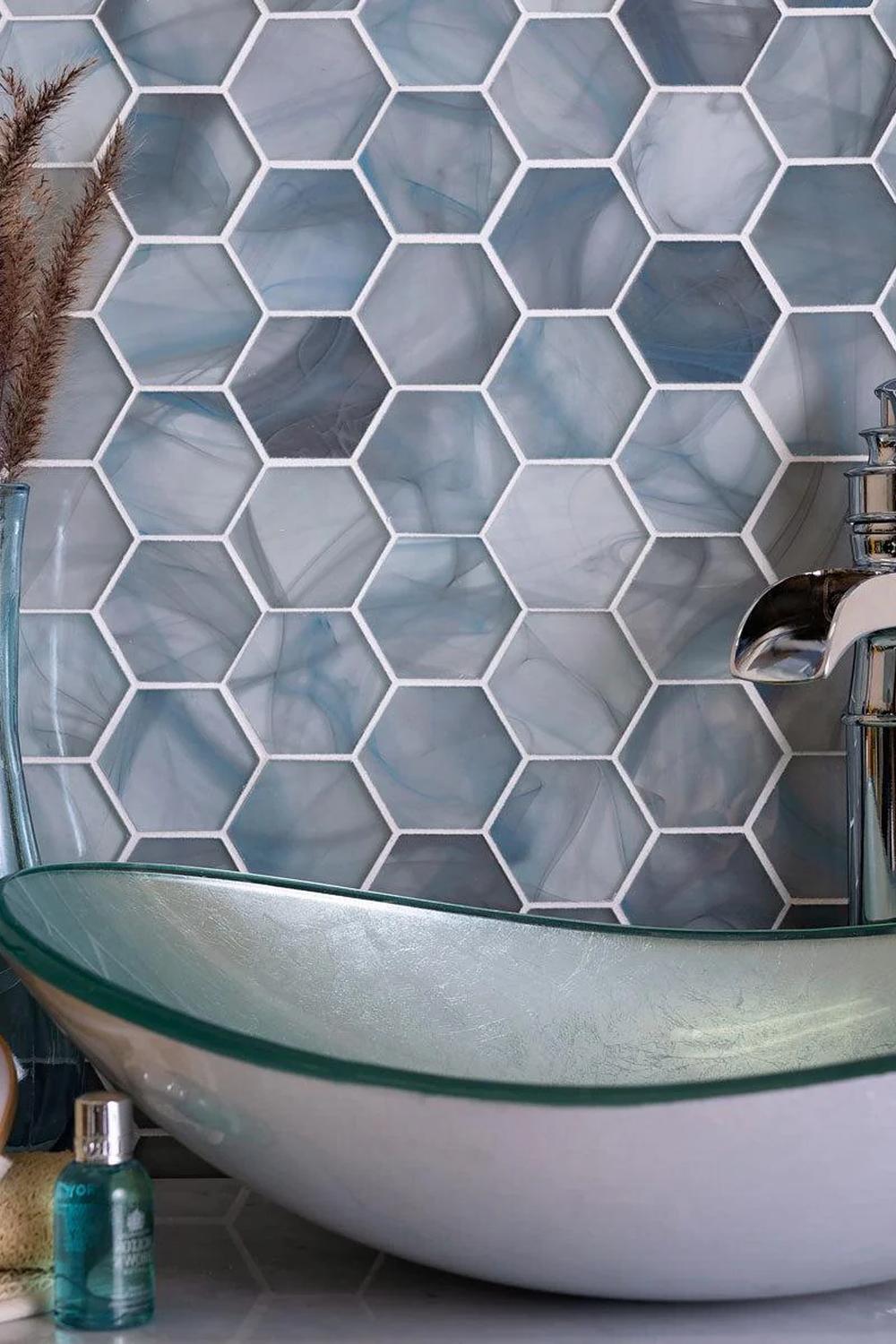 Cozy bathroom featuring hexagonal blue mosaic tiles and harmonious design elements.