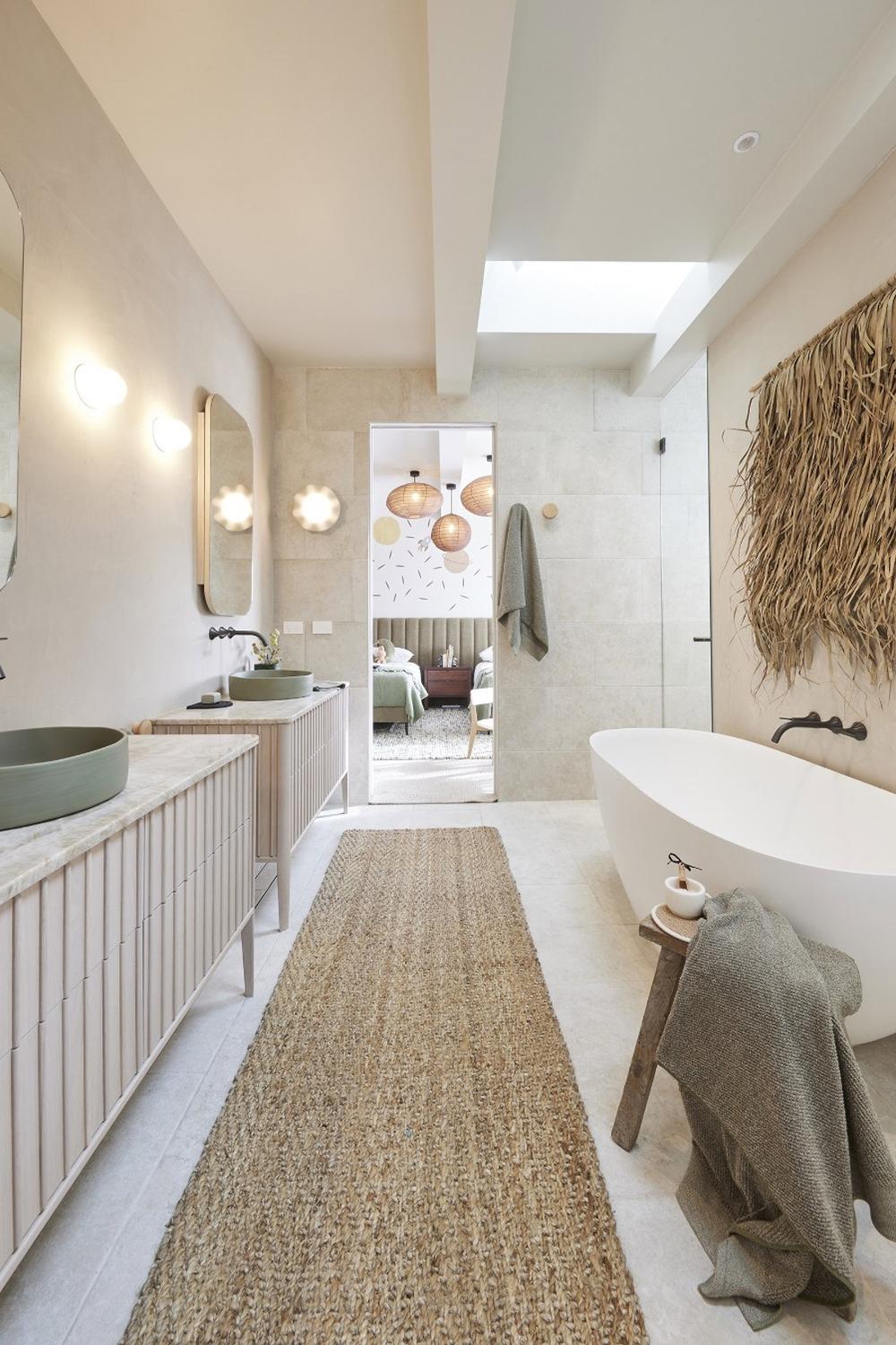 A serene neutral boys bathroom designed for calmness