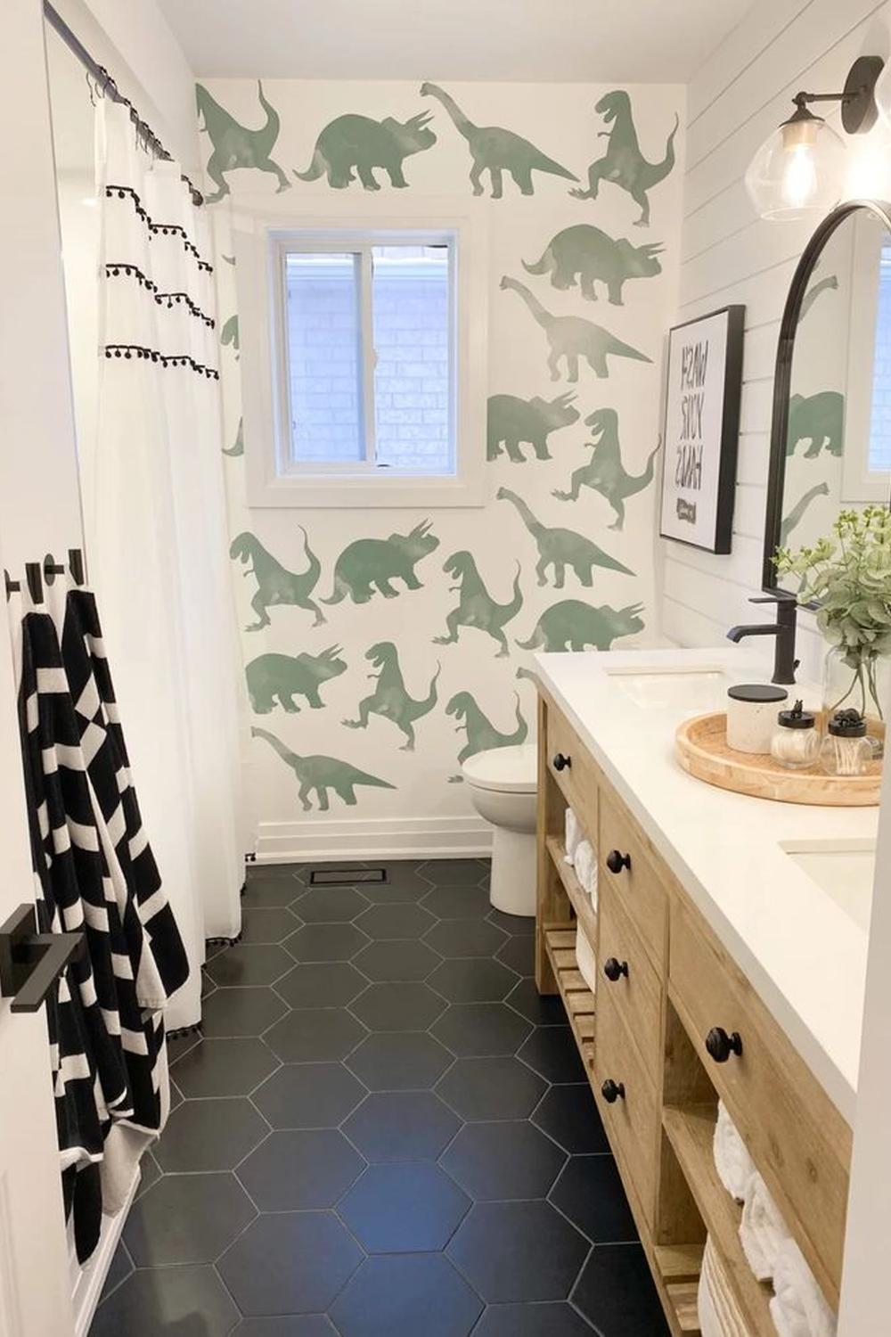 Vibrant bathroom featuring dinosaur patterned walls and playful decor.