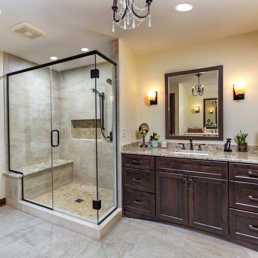 A Modern Bathroom with a Dark Brown Vanity Featuring Multiple Storage Drawers