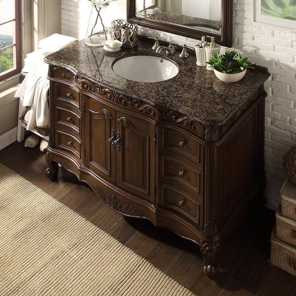 A Modern Bathroom Featuring a Textured Brown Vanity Cabinet and Complementary Dark Elements