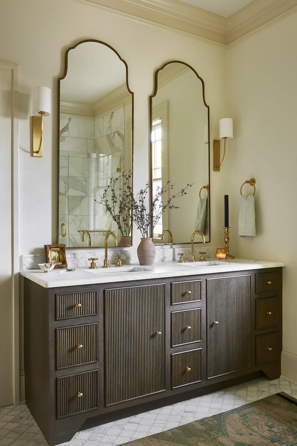 A Spacious Dual-Sink Brown Vanity with a Textured Finish and Elegant Accents