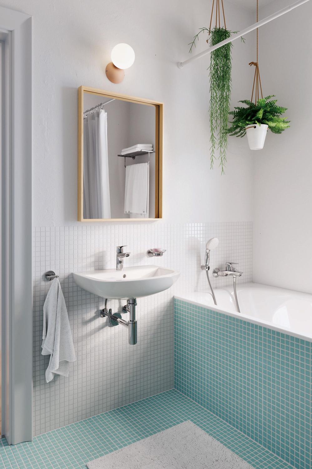 Baño minimalista en tonos aqua con azulejos blancos